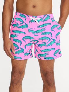 Grab your sunglasses and your flamingo floaty and sink into island time with these classic swimmers. These jealousy-inducing trunks feature an ultra quick drying shell, mesh basket liner and a zipper back pocket. Not to mention the elastic waistband and build-in drawstring designed to keep your trunks secure from the swim up bar all the way to the all you can eat crab leg buffet. Fabric: 92% Polyester/8% Spandex Machine Wash Cold, Tumble Dry Low Best for: Swimming, Sunbathing, Boat Days, Boogie Boat Days, Swim Up Bar, Basket Liners, Sweat Shorts, Stretch Shorts, Back Pocket, Sport Shorts, Swim Trunks, Swim Shorts