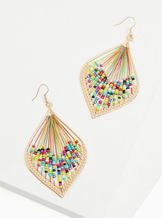 These threaded teardrop earrings feature colorful beads to create a one-of-a-kind design. French hook. Base metal. Imported. The best plus size women's gold-tone & multi bead threaded teardrop earrings in multi. Torrid is your destination for cozy fall and winter clothes to keep you warm and comfortable. Adjustable Teardrop Earrings With Gold Beads, Beaded Teardrop Earrings For Summer, Summer Beaded Teardrop Earrings, Gold Teardrop Earrings For Summer, Summer Teardrop Beaded Earrings, Trendy Multicolor Teardrop Jewelry, Multicolor Wire Wrapped Dangle Beaded Earrings, Multicolor Wire Wrapped Beaded Earrings, Summer Dangling Bead Teardrop Earrings