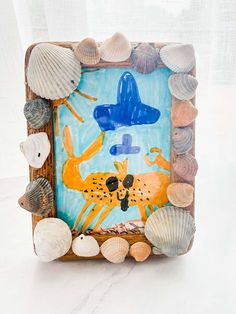 an art work with seashells and sea shells