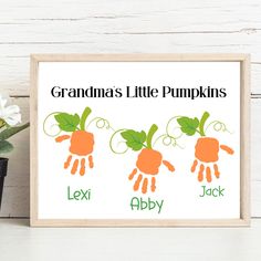 a poster with three carrots and the words grandma's little pumpkins