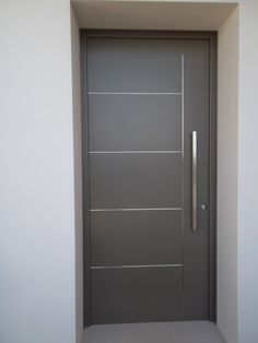 the door is made of glass and has a metal handle