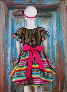 "Colorful Fiesta Outfit in Serape and Leopard Animal Print Perfect as a Pageant OOC, Wild Wear, Runway Wear and Fun Fashion Outfit Having a Fiesta Birthday Party? This outfit is perfect! 7 Piece Set includes: Peasant Top Flat Front Shorts High Low Fully Lined Skirt with Sash Headband with Large Bow 2 Pink Removable Bows 1 Serape Removable Bow Hand Made in the USA by Me! 100% Cotton Fabric Size 4T pictured and Ready to Ship All sizes can be ordered All of my Unique items are Sewn in a Clean Smoke Festive Multicolor Dress With Ruffles, Festive Multicolor Ruffle Dresses, Multicolor Fiesta Dresses, Fitted Ruffle Dress For Fiesta, Traditional Multicolor Dress For Fiesta, Traditional Multicolor Fiesta Dress, Fiesta Multicolor Ruffled Dresses, Multicolor Short Sleeve Dress For Fiesta, Pink Fitted Dress For Fiesta