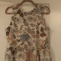 This Blouse Has Never Before Been Worn. It Is Sleeveless And Flowy With A Button Clasp For The Closure. A Floral/Paisley Print With The Occasional Sparkling Gold Polka Dot. Gold Polka Dots, Sleeveless Blouse, Paisley Print, Polka Dot, Paisley, Loft, Top Blouse, Womens Tops, Floral