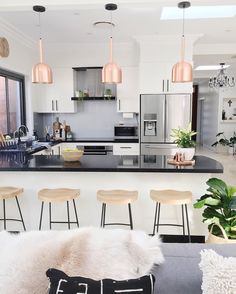 an instagram photo of a kitchen and living room