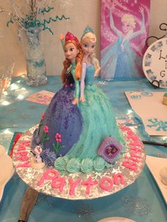 there is a cake that has been made to look like princesses