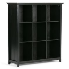 a black bookcase with four shelves and two doors