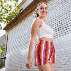 Add these cute lesbian shorts to your pride wardrobe. These lesbian sunset flag stripe shorts are a great way to show off your gay pride and not only are they super cool for pride events and festivals, they are functional athletic shorts made for swimming, running and other sporting activities and you'll won't want to be without them when heading to the beach or lounging by the pool. You'll also appreciate the mesh pockets large enough to hold your phone. DETAILSComfortable elastic waistband wit Casual Multicolor Athletic Shorts, Summer Striped Shorts For Poolside, Casual Multicolor Short Athletic Shorts, Multicolor Short Athletic Shorts For Summer, Rainbow Bottoms For Beach In Summer, Multicolor Summer Athletic Shorts, Rainbow Bottoms For Beach And Summer, Casual Multicolor Shorts For Poolside, Casual Multicolor Poolside Shorts