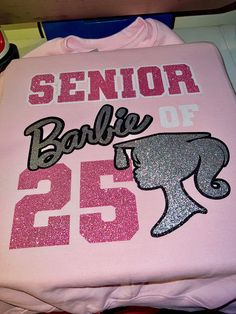 Perfect for all BARBIE lovers! The sweatshirts shown are examples of what you will get. Of course, it will be 24 instead of 23. This sweatshirt can be made with solid or glitter vinyl. OR both but we prefer glitter over anything✨ Leave a lasting impression with this beauty. The sweatshirts shown are examples of what you will get. Leave your desired color(s) in the note section at checkout. When will my product arrive? Processing Time: 15 - 20 Business Days During holidays, please expect delays as the number of orders is slightly higher than usual, although we will do our best to get your order to you as soon as possible. Shipping Time First Class shipping will take 2-5 Business Days Priority shipping will take 2-3 Business Days. If you need the items fast, please look up our RUSH FEES! Ret Senior Barbie, Vinyl Sweatshirt Ideas, Senior Sweatshirts Ideas, Senior Board, Senior Sweatshirts, Barbie Sweatshirt, Senior Jeans, Senior Stuff, Senior Photo Outfits