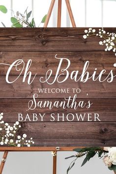 a wooden sign with baby's breath written on it that says, oh babies welcome to samatha's baby shower