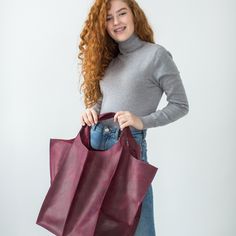 This handmade women tote bag is produced of crazy horse leather. It has one large compartment and has one pocket - inside. This bag is simple, reliable, and durable. Its universal look allows to use the tote bag for various purposes. One may take the bag to the work, shopping, meeting, or walk and feel comfortable with it at any conditions. Size and Dimensions: Large: Height: 16.14 inches (41 cm) Width: 12.2 inches (31 color m) Depth: 10.2 inches (26 cm) Inside pocket: Height: 12.2 inches (31 cm Burgundy Square Leather Shoulder Bag, Large Leather Box Bag For Shopping, Large Capacity Leather Satchel In Burgundy, Large Capacity Burgundy Leather Satchel, Large Capacity Burgundy Leather Bag, Burgundy Rectangular Satchel In Soft Leather, Rectangular Burgundy Satchel In Soft Leather, Burgundy Rectangular Soft Leather Satchel, Rectangular Burgundy Soft Leather Satchel