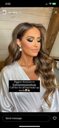 a woman with long hair and makeup looks at the camera while wearing a white dress