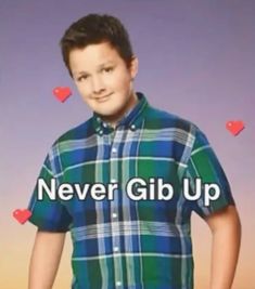 a young man wearing a plaid shirt with hearts on it and the words never gib up above him