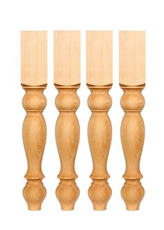 four wooden candlesticks lined up in a row