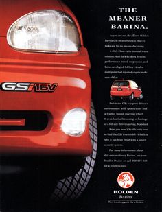 the front end of a red car with an advertisement for it's bumper lights