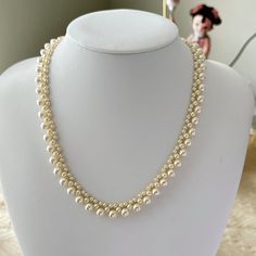 Length: 40 cm + extension 5 cm (15.75 inches + 2 inches) Beads: Swarovski Crystal Pearl Filings: Gold Plated and Nickel free Enhance your elegance with our Custom Swarovski Crystal Pearl Necklace, meticulously handmade and customizable to your preferred bead size. This beautiful necklace is an ideal gift for bridesmaids or any special occasion, showcasing high-quality pearls that add sophistication to any outfit. Each necklace is delivered in a premium jewelry box with gift packaging, making it Classic Pearl White Bridal Necklace For Party, Classic Pearl White Beaded Necklaces For Weddings, Elegant Cream Beaded Necklaces For Formal Occasions, Classic Cream Necklace For Party, Elegant Formal Cream Beaded Necklaces, Swarovski Pearl Necklace, Swarovski Jewelry Necklace, Gift For Bridesmaids, Premium Jewelry