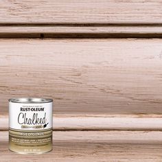 a can of rust - oleum chalked paint sitting on top of a wooden surface