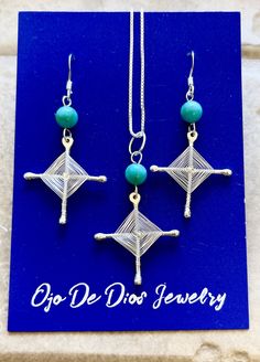 "Sterling Silver Handmade Ojo De Dios necklace wound with Fine Silver. This is an earring and necklace set. The beads are natural turquoise. The pendant comes with your choice of either 16\" or 18\" box chain. Please message me with what length you would like. Ojo De Dios ( Eye Of God) This special symbol has been made and used throughout North American cultures for thousands of years. Originally crafted by the Huichol (Wixáritari) Indians and used for protection and spiritual traditions." Turquoise Spiritual Jewelry With Matching Earrings, Gods Eye, Special Symbols, Box Chain, Natural Turquoise, Eye Jewelry, Fine Silver, Handmade Silver, Necklace Set