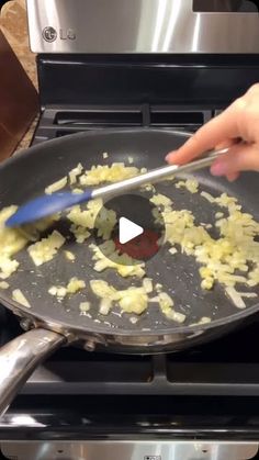 someone is frying onions in a pan on the stove