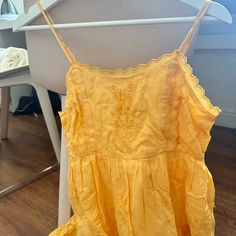 Never Worn Just Been Sitting In My Closet But This Is The Perfect Yellow Mini Dress!! Size Xs. Bought In 2020 So Idk If They Still Sell It Anymore. Would Fit Xxs-M Because Of The Adjustable Straps Casual Summer Sundress For Daywear, Summer Linen Mini Dress For Daywear, Summer Cotton Mini Dress For Brunch, Summer Cotton Midi Dress, Summer Cotton Sundress With Embroidery, Cotton Sundress For Summer, Cotton Summer Dress For Brunch, Sleeveless Cotton Midi Dress For Beach Season, Cotton Sundress For Summer Day Out