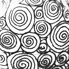 black and white drawing of spirals on paper