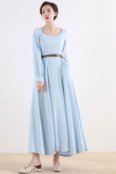 "This Vintage inspired Medieval dress Crafted with soft cotton linen in blue hues, featuring pleated detail on the waist, this Long sleeve maxi dress will give you a perfect silhouette. This is a sophisticated, simple, timeless but also somehow contemporary. Wear this blue dress for your leisurely life. DETAIL * Medium weight cotton linen blend fabric (50% Linen, 50% Cotton) * Two side seam pockets * Long Lantern sleeve * Right side zipper * Pleat detailed waist * Ankle length * Perfect for both Blue Linen Long Sleeve Maxi Dress, Blue Linen Maxi Length Dress For Spring, Blue Linen Maxi Dress For Spring, Blue Maxi Linen Dress For Spring, Medieval Dress Blue, Blue Medieval Dress, Long Dress Modest, Blue Dress Long, Dress Modest