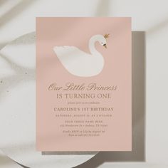 a little princess is turning one birthday party card with a swan on it's back