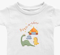 "100% cotton t-shirt with a classic crewneck a cute, kid friendly design for mini members of the Ummah! A perfect gift for muslim children. Designed by @marz.art.studio The t-shirt reads \"Deen-o-saur\" Product details:  - Twin needle stitching  - 4-5 oz/yard²; 150-160 g/m²  - 100% cotton  - Relaxed fit  - Tear-away label Fits true to size.  Care details:  - Machine wash warm (max 40C or 105F), wash garment inside out with similar colours - Tumble Dry: Low - Bleach: Only non-chlorine - Do not dr Playful Short Sleeve T-shirt As Gift, Basic Crew Neck T-shirt For Birthday, White Cartoon Print T-shirt For Gifts, White T-shirt With Cartoon Print For Gift, Unisex White T-shirt As A Gift, Playful Crew Neck Top With Name Print, Playful Unisex Name Print T-shirt, Playful Unisex T-shirt With Name Print, Unisex White T-shirt With Cartoon Print