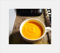 a bowl of soup sitting on top of a counter