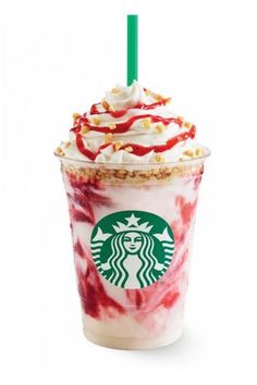 a starbucks drink with whipped cream and strawberries on the top, sitting in front of a white background