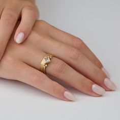 This lovely 4mm hammered band is a special yet classic choice as a wedding or commitment band. The hammered texture is both organic and refined. It stands alone, or stacks wonderfully with other rings in our collection. Matte finish. Shown in 18k yellow gold, this ring is available in white gold or platinum upon request. 14k Gold Hammered Stackable Rings For Anniversary, Elegant Hammered Diamond Rings, Heirloom Style Recycled Gold Diamond Ring For Wedding, Modern Hand Forged Stackable Rings For Anniversary, Gold Hand Forged Diamond Ring For Anniversary, Timeless Gold Stackable Rings With Tension Setting, Heirloom Style Stackable Rings With Single Diamond For Wedding, Anniversary Gold Hand Forged Diamond Ring, Fine Jewelry Hand Forged Stackable Wedding Rings