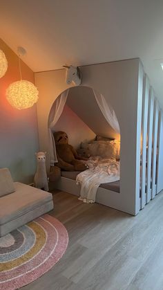 a room that has some kind of bed inside of it with lights on the ceiling