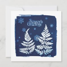 a card with snowflakes on it and the words season's greetings