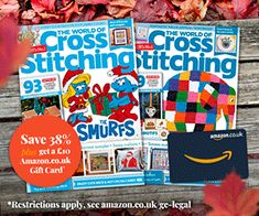 the front cover of cross stitching magazine with autumn leaves around it and an image of smurfs