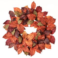 a wreath made out of leaves on a white background