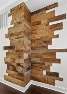 a room with wooden planks on the wall