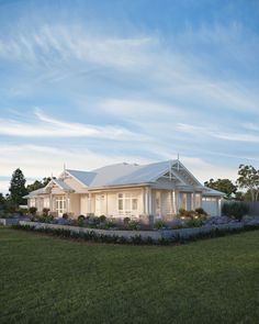 an artist's rendering of a house in the middle of a flowerbed garden