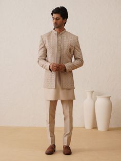 Designed with Resham Work Jodhpuri Suit for the Groom and his squad. Crafted from the most luxurious silk, this item will have you feeling like a royal. This jodhpuri including an open Prince Coat and an inside kurta paired with slim-cut trousers. Note: Some color variations may occur owing to photography causes. Up to 1 inch of measurement fluctuation is possible. COST INCLUDES BLAZER,TROUSER & INNER  KURTA Jotpuri Suit For Men Kurta, Coat Kurta Men, Kurta Jodhpuri Men, Reception Wear Men, Printed Shirt With Blazer Men, Jodhpuri New Pattern, Royal Jodhpuri Suits For Men, Jodhpuri Kurta For Men Wedding, Jodhpuri Suits For Men Designer