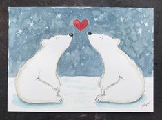 two polar bears are facing each other with a red heart