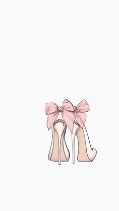 a pair of high heeled shoes with pink bows