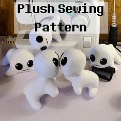 three stuffed animals sitting next to each other on top of a sewing machine with the words plush sewing pattern