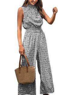 PRICES MAY VARY. [Unique Design]: The Ditsy Floral Smocked Mock Neck Jumpsuit, a playful and trendy outfit that combines the charm of ditsy florals with the comfort of a jumpsuit, featuring a flattering smocked bodice and a chic mock neck, making it the perfect choice for those seeking fashion-forward versatility. [Premium Fabric]: The jumpsuit is made of 100% Polyester so that it is cozy and soft with slight elasticity [Multi Occasional & Gifting]: This jumpsuit is Perfect for Graduation, Beach Coastal Chic Attire, Country Club Casual Attire Women, Resort Casual Attire Women, Resort Wear For Women Classy, Airport Outfit Classy, Country Club Attire, Cute Travel Outfits, Club Attire, Womens Black Jumpsuit