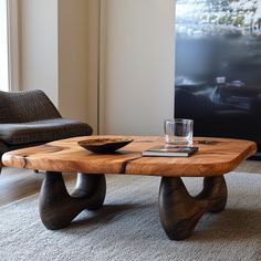 a wooden table sitting on top of a carpeted floor