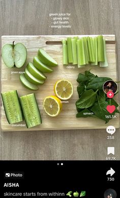 a cutting board topped with sliced up fruit and vegetables