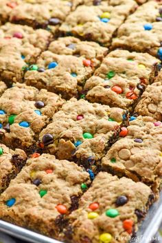 a tray filled with cookies and candy bars