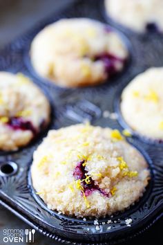 freshly baked muffins with lemon and cranberry filling on a baking tray