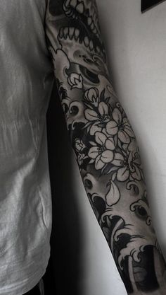 a person with a tattoo on their arm