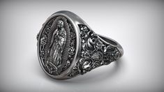 Ring Program Details Material: 925K Sterling Silver(The gold portion is copper)- Weight: 14- 17 grams-Size: 7-15-Ring height: .0.75inch the Virgin of Guadalupe has been proclaimed "Queen of Mexico", "Patroness of the Americas", "Empress of Latin America", and "Protectress of Unborn Children" Our Lady of Guadalupe always appears in this image:the mandorla-shaped sunburst around the Virgin, the stars on her cloak, the Moon under her feet, and the angel with a folded cloth supporting her. "clothed 15 Ring, The Virgin Of Guadalupe, Ring Jewelry Box, 15 Rings, Virgin Of Guadalupe, Our Lady Of Guadalupe, Lady Of Guadalupe, Jewelry Ring Box, Latin America