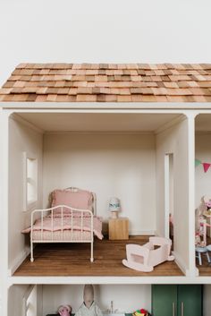 a doll house with furniture and accessories in it