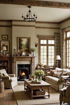 a living room filled with furniture and a fire place in the middle of a room