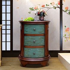 The perfect marriage of coffee-colored framework and blue drawers, each with interiors finely painted, creates a fetching piece that's as much a work of art as a functional furnishing. Alcott Hill® | Alcott Hill® American nightstand side cabinet / greenWood in Brown | 28.15" H X 20.87" W X 16.14" D | Wayfair Three Aesthetic, Blue Drawers, The Perfect Marriage, Freestanding Storage Cabinet, Painted Cupboards, Freestanding Storage, Accent Chests And Cabinets, Small Space Living Room, Living Room Bookcase